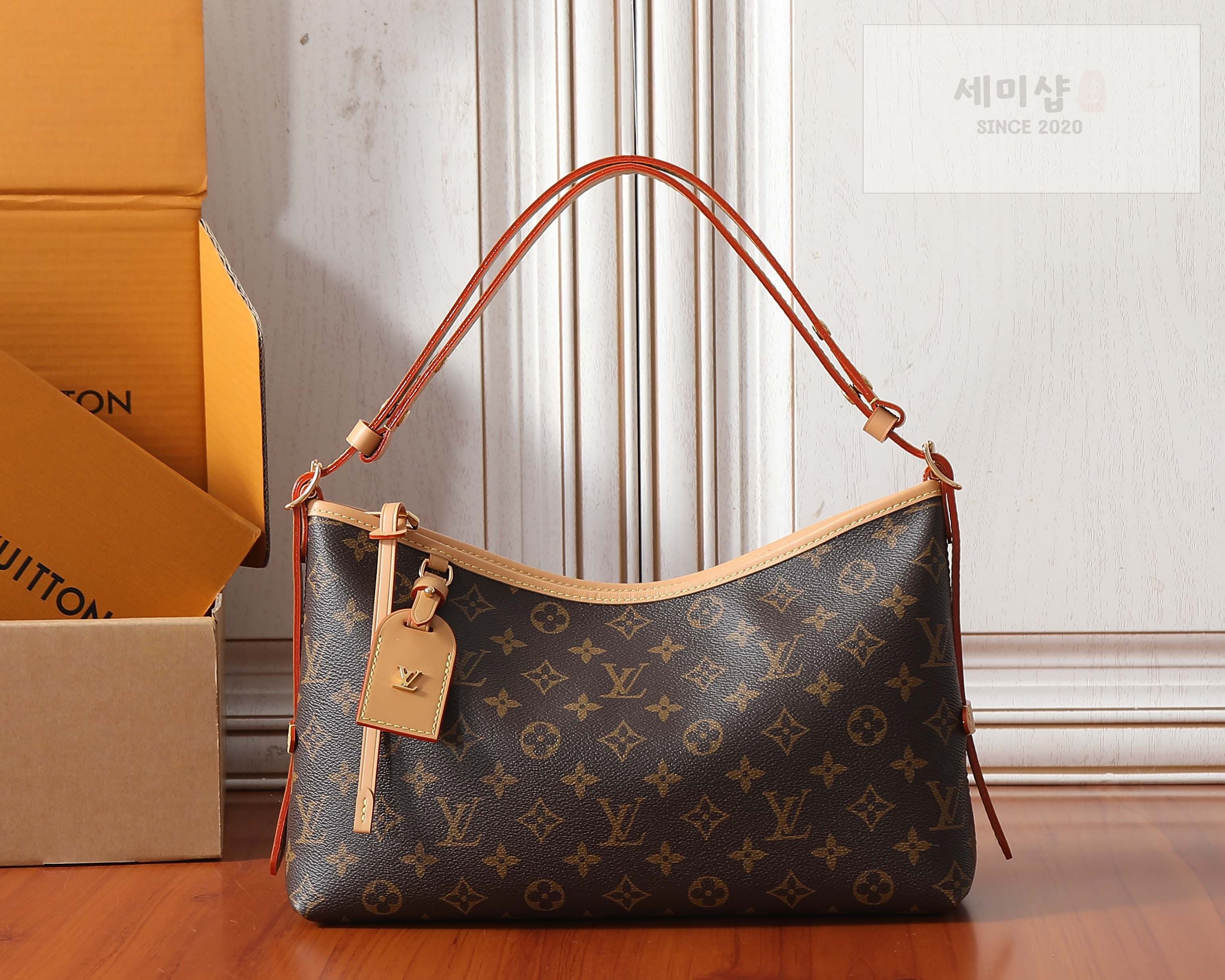 루이비통 루이비통 캐리올 이스트 웨스트 모노그램 캔버스 Bag